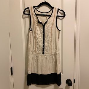 Cream and black drop waist dress. Button details down the front.